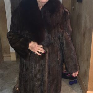 Brown mink with fox fur coat from Finland .